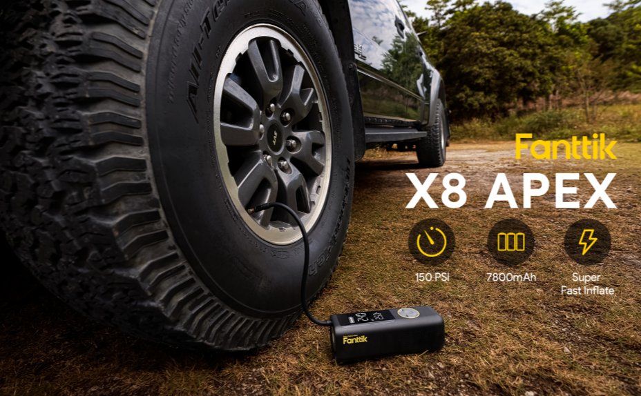Fanttik X8 APEX inflating a pickup truck tire outdoors